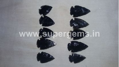 Picture of black obsidian glass arrowheads