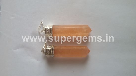 Picture of red orange pencil pendant