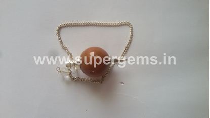 Picture of red jesper ball pendulums