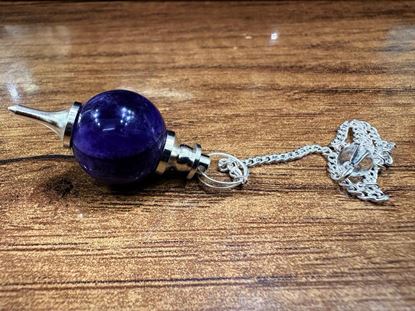 Picture of amethyst ball pendulums